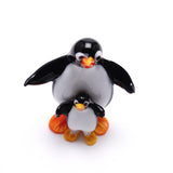 「Penguin parent and child」