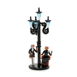 miniature Street lamps and aristocratic men and women