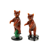 miniature  Bears doing acrobatics