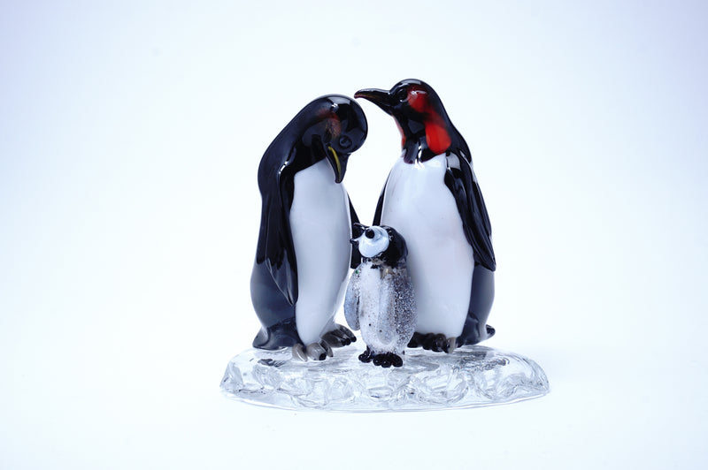 「Penguin family on iceberg」