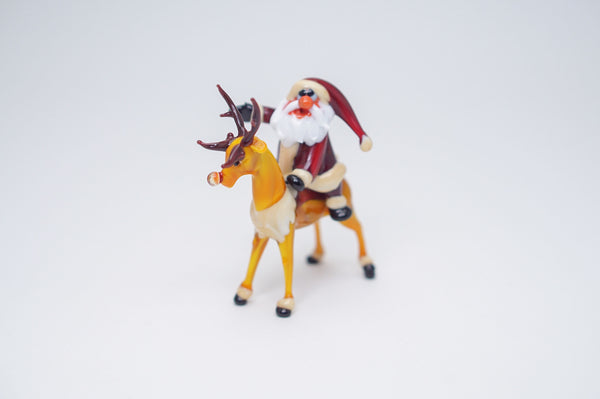 Santa Claus Rides reindeer