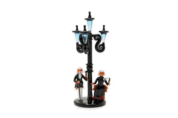 miniature Street lamps and aristocratic men and women